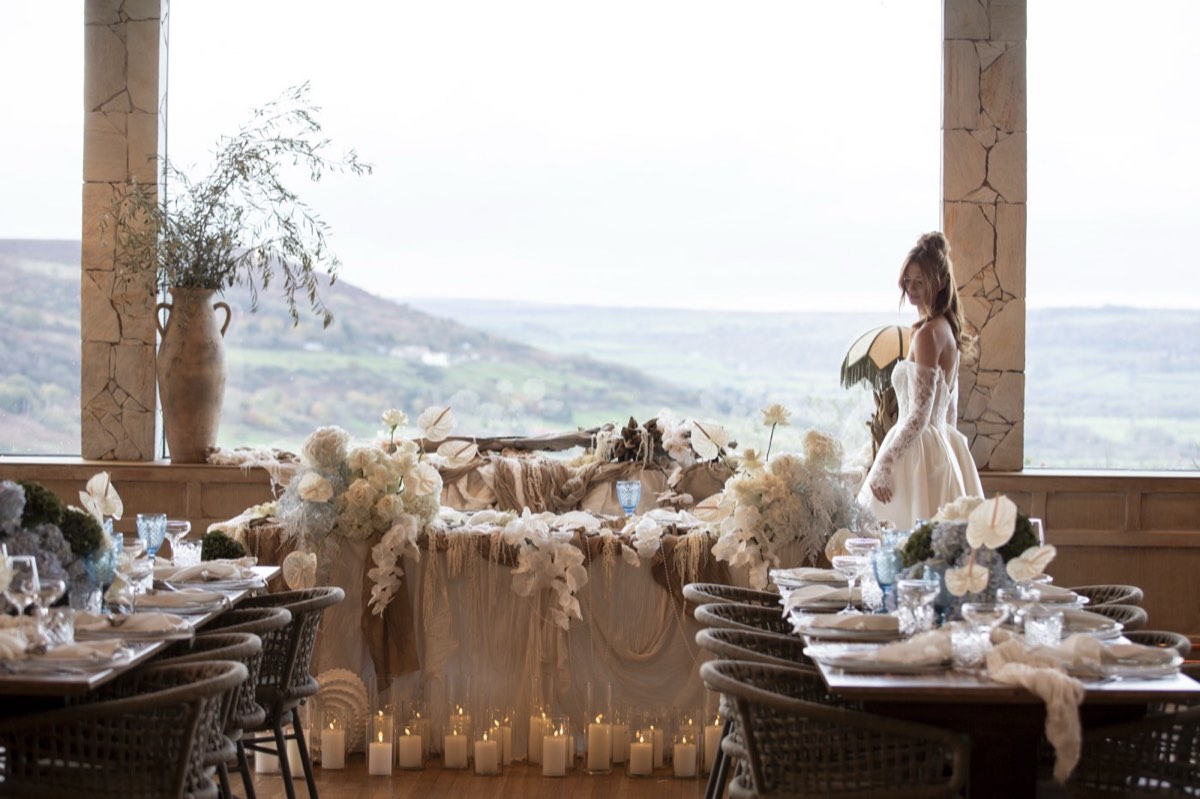 A wedding table set in front of the valley view at Grand Villa Heights